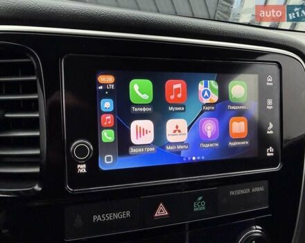 Красный Мицубиси Аутлендер, объемом двигателя 2 л и пробегом 176 тыс. км за 18900 $, фото 29 на Automoto.ua