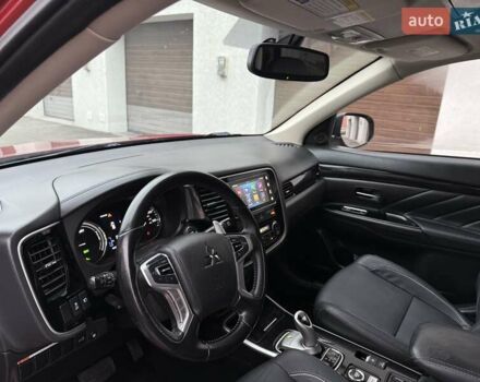 Красный Мицубиси Аутлендер, объемом двигателя 2 л и пробегом 176 тыс. км за 18900 $, фото 12 на Automoto.ua