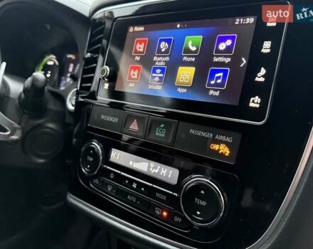 Красный Мицубиси Аутлендер, объемом двигателя 2 л и пробегом 176 тыс. км за 18900 $, фото 23 на Automoto.ua