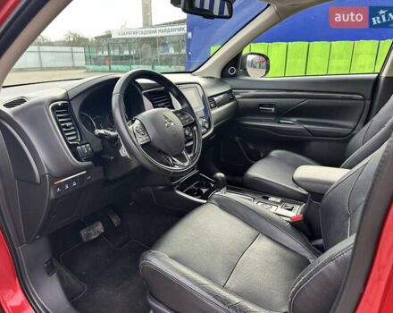 Красный Мицубиси Аутлендер, объемом двигателя 2.2 л и пробегом 118 тыс. км за 20999 $, фото 32 на Automoto.ua