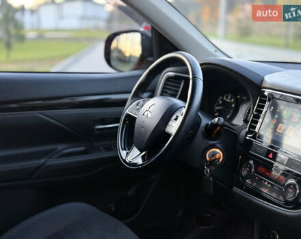 Красный Мицубиси Аутлендер, объемом двигателя 2 л и пробегом 85 тыс. км за 18900 $, фото 24 на Automoto.ua