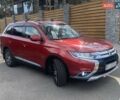 Красный Мицубиси Аутлендер, объемом двигателя 2.4 л и пробегом 75 тыс. км за 16550 $, фото 13 на Automoto.ua