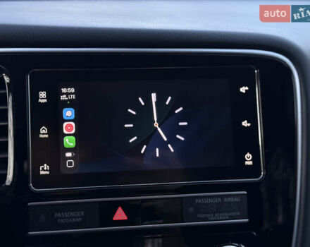 Красный Мицубиси Аутлендер, объемом двигателя 2 л и пробегом 85 тыс. км за 18900 $, фото 79 на Automoto.ua