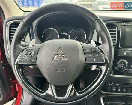 Красный Мицубиси Аутлендер, объемом двигателя 2.2 л и пробегом 118 тыс. км за 20999 $, фото 41 на Automoto.ua