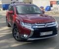 Красный Мицубиси Аутлендер, объемом двигателя 2.4 л и пробегом 75 тыс. км за 16550 $, фото 10 на Automoto.ua