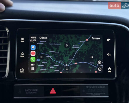 Красный Мицубиси Аутлендер, объемом двигателя 2 л и пробегом 85 тыс. км за 18900 $, фото 85 на Automoto.ua