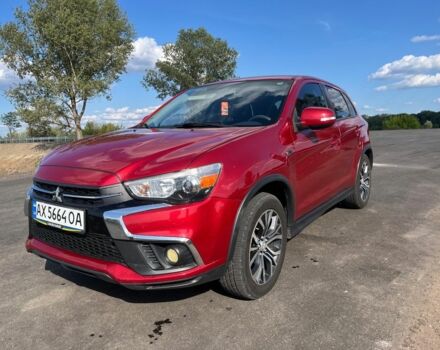 Красный Мицубиси Аутлендер, объемом двигателя 2 л и пробегом 130 тыс. км за 14300 $, фото 1 на Automoto.ua