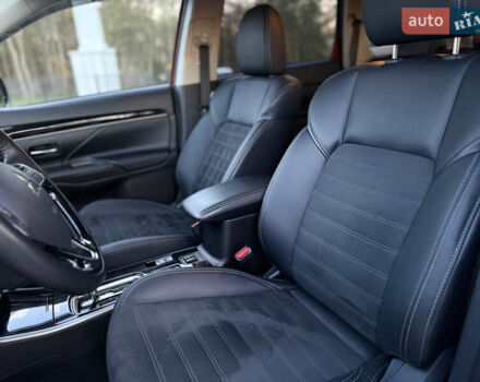 Красный Мицубиси Аутлендер, объемом двигателя 2 л и пробегом 85 тыс. км за 18900 $, фото 29 на Automoto.ua