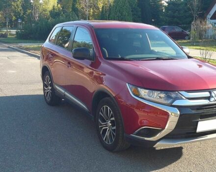 Красный Мицубиси Аутлендер, объемом двигателя 2.4 л и пробегом 117 тыс. км за 10500 $, фото 4 на Automoto.ua