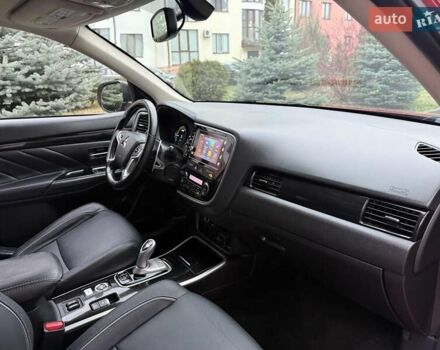 Красный Мицубиси Аутлендер, объемом двигателя 2 л и пробегом 176 тыс. км за 18900 $, фото 13 на Automoto.ua