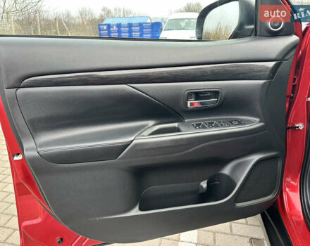 Красный Мицубиси Аутлендер, объемом двигателя 2.2 л и пробегом 118 тыс. км за 20999 $, фото 33 на Automoto.ua