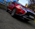 Красный Мицубиси Аутлендер, объемом двигателя 2.4 л и пробегом 125 тыс. км за 17400 $, фото 7 на Automoto.ua