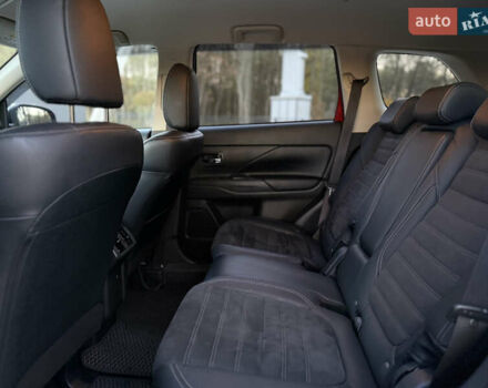 Красный Мицубиси Аутлендер, объемом двигателя 2 л и пробегом 85 тыс. км за 18900 $, фото 53 на Automoto.ua