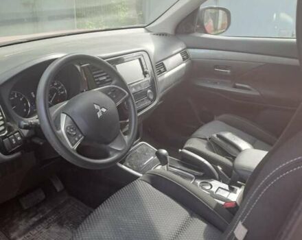 Красный Мицубиси Аутлендер, объемом двигателя 2.36 л и пробегом 82 тыс. км за 16000 $, фото 4 на Automoto.ua