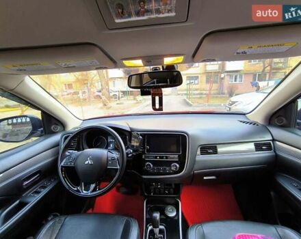 Красный Мицубиси Аутлендер, объемом двигателя 2.4 л и пробегом 125 тыс. км за 17400 $, фото 9 на Automoto.ua