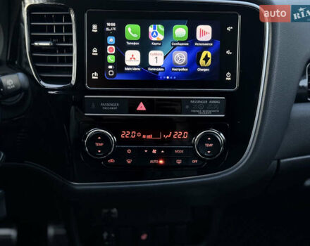 Красный Мицубиси Аутлендер, объемом двигателя 2 л и пробегом 85 тыс. км за 18900 $, фото 39 на Automoto.ua