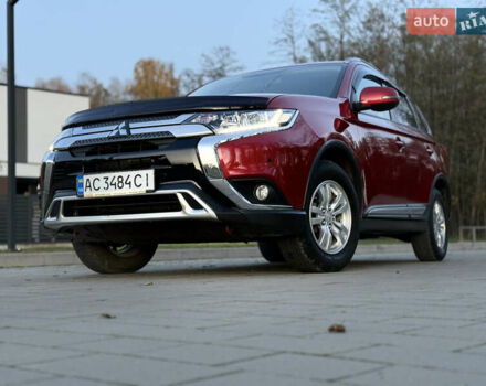 Красный Мицубиси Аутлендер, объемом двигателя 2 л и пробегом 85 тыс. км за 18900 $, фото 109 на Automoto.ua
