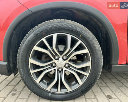 Красный Мицубиси Аутлендер, объемом двигателя 2.2 л и пробегом 118 тыс. км за 20999 $, фото 8 на Automoto.ua