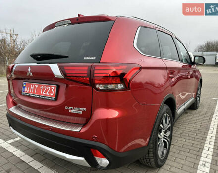 Красный Мицубиси Аутлендер, объемом двигателя 2.2 л и пробегом 118 тыс. км за 20999 $, фото 25 на Automoto.ua