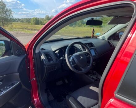 Красный Мицубиси Аутлендер, объемом двигателя 2 л и пробегом 130 тыс. км за 14300 $, фото 6 на Automoto.ua