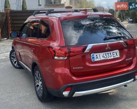 Красный Мицубиси Аутлендер, объемом двигателя 2.4 л и пробегом 75 тыс. км за 16550 $, фото 12 на Automoto.ua