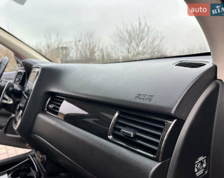 Красный Мицубиси Аутлендер, объемом двигателя 2.2 л и пробегом 118 тыс. км за 20999 $, фото 56 на Automoto.ua