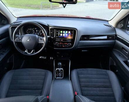 Красный Мицубиси Аутлендер, объемом двигателя 2 л и пробегом 85 тыс. км за 18900 $, фото 27 на Automoto.ua