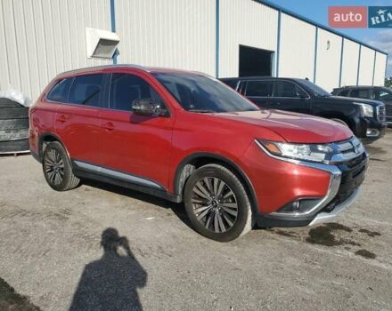 Червоний Міцубісі Аутлендер, об'ємом двигуна 2.4 л та пробігом 121 тис. км за 3500 $, фото 3 на Automoto.ua