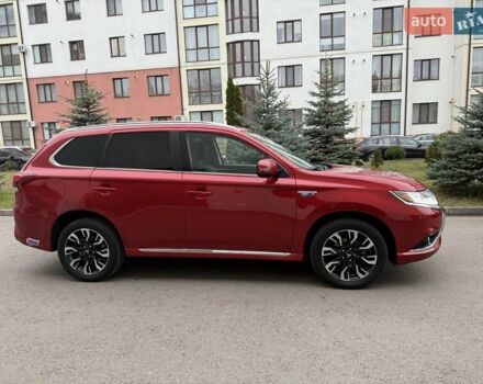 Красный Мицубиси Аутлендер, объемом двигателя 2 л и пробегом 176 тыс. км за 18900 $, фото 3 на Automoto.ua