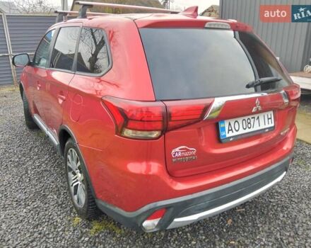 Красный Мицубиси Аутлендер, объемом двигателя 2.36 л и пробегом 110 тыс. км за 16800 $, фото 8 на Automoto.ua