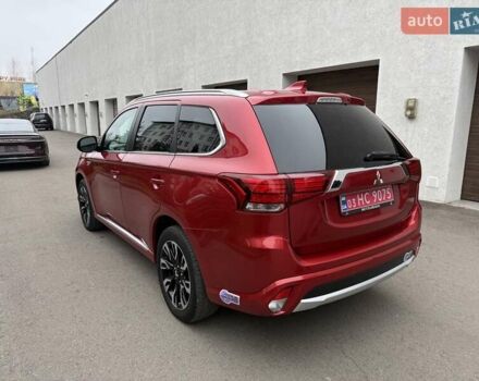 Красный Мицубиси Аутлендер, объемом двигателя 2 л и пробегом 176 тыс. км за 18900 $, фото 6 на Automoto.ua