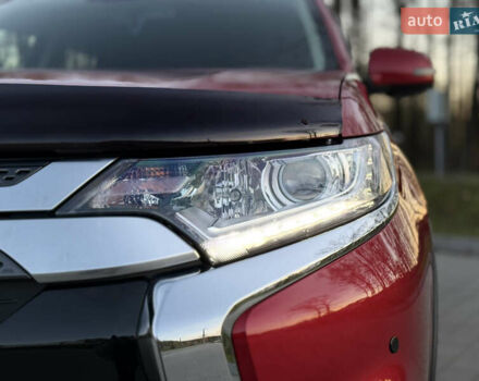 Красный Мицубиси Аутлендер, объемом двигателя 2 л и пробегом 85 тыс. км за 18900 $, фото 17 на Automoto.ua