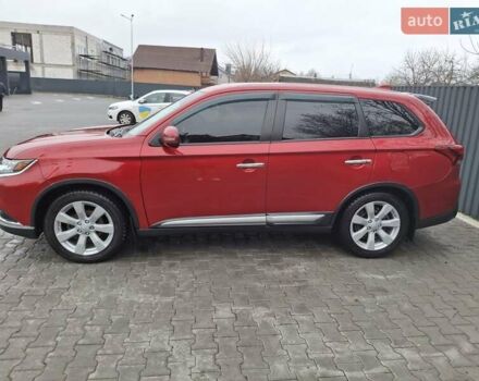 Красный Мицубиси Аутлендер, объемом двигателя 2.36 л и пробегом 110 тыс. км за 19000 $, фото 2 на Automoto.ua