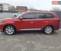 Красный Мицубиси Аутлендер, объемом двигателя 2.36 л и пробегом 110 тыс. км за 19000 $, фото 2 на Automoto.ua