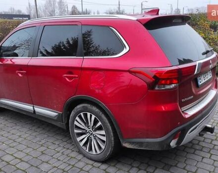Червоний Міцубісі Аутлендер, об'ємом двигуна 3 л та пробігом 127 тис. км за 28500 $, фото 3 на Automoto.ua