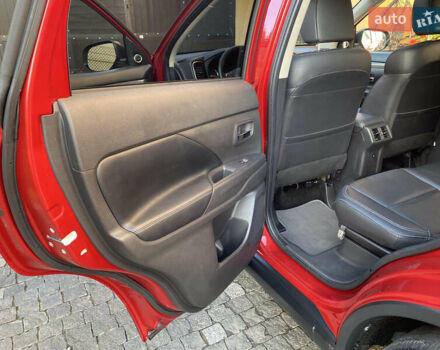 Красный Мицубиси Аутлендер, объемом двигателя 3 л и пробегом 106 тыс. км за 20700 $, фото 51 на Automoto.ua