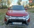 Червоний Міцубісі Аутлендер, об'ємом двигуна 2.36 л та пробігом 31 тис. км за 19200 $, фото 1 на Automoto.ua