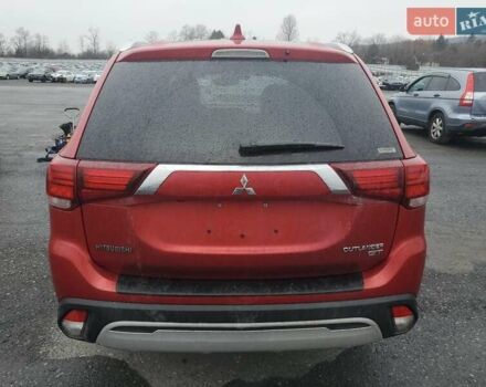 Красный Мицубиси Аутлендер, объемом двигателя 3 л и пробегом 100 тыс. км за 3000 $, фото 5 на Automoto.ua
