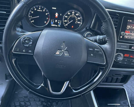 Красный Мицубиси Аутлендер, объемом двигателя 2.36 л и пробегом 100 тыс. км за 16500 $, фото 11 на Automoto.ua