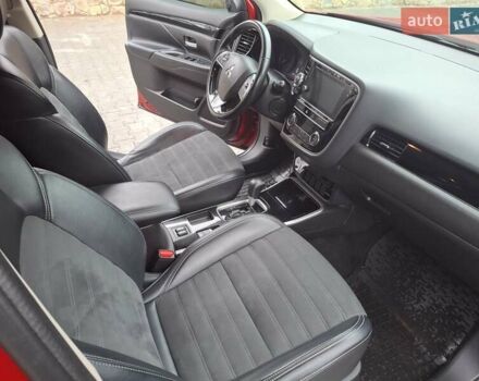 Красный Мицубиси Аутлендер, объемом двигателя 2.36 л и пробегом 110 тыс. км за 19000 $, фото 10 на Automoto.ua