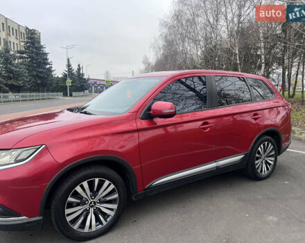 Червоний Міцубісі Аутлендер, об'ємом двигуна 2.36 л та пробігом 148 тис. км за 16500 $, фото 2 на Automoto.ua