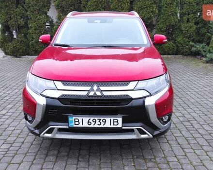 Червоний Міцубісі Аутлендер, об'ємом двигуна 3 л та пробігом 127 тис. км за 28500 $, фото 6 на Automoto.ua