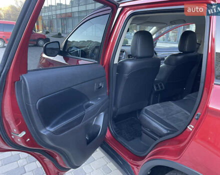 Красный Мицубиси Аутлендер, объемом двигателя 2.36 л и пробегом 100 тыс. км за 16500 $, фото 12 на Automoto.ua