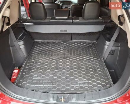 Красный Мицубиси Аутлендер, объемом двигателя 2.36 л и пробегом 110 тыс. км за 19000 $, фото 26 на Automoto.ua