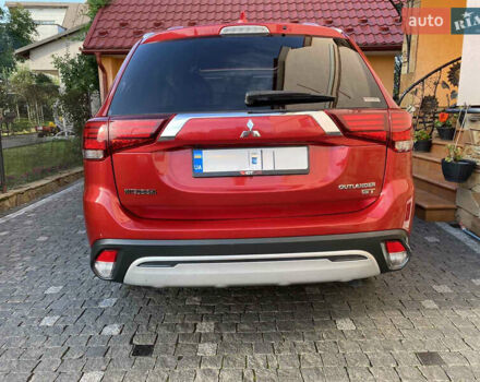 Красный Мицубиси Аутлендер, объемом двигателя 3 л и пробегом 106 тыс. км за 20700 $, фото 31 на Automoto.ua