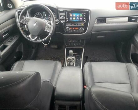 Красный Мицубиси Аутлендер, объемом двигателя 3 л и пробегом 100 тыс. км за 3000 $, фото 7 на Automoto.ua