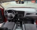 Красный Мицубиси Аутлендер, объемом двигателя 2.36 л и пробегом 110 тыс. км за 19000 $, фото 16 на Automoto.ua