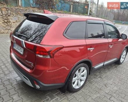 Красный Мицубиси Аутлендер, объемом двигателя 2.36 л и пробегом 110 тыс. км за 19000 $, фото 7 на Automoto.ua