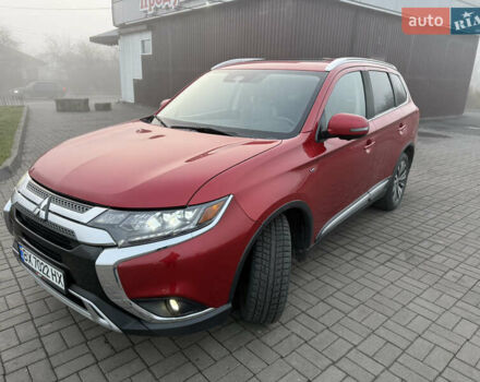 Красный Мицубиси Аутлендер, объемом двигателя 3 л и пробегом 106 тыс. км за 20700 $, фото 20 на Automoto.ua