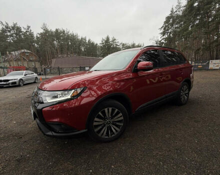 Красный Мицубиси Аутлендер, объемом двигателя 2.4 л и пробегом 197 тыс. км за 18700 $, фото 5 на Automoto.ua